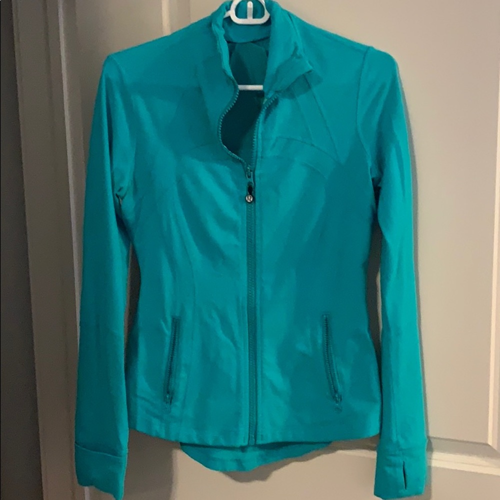 Lululemon turquoise runners jacket.
